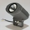 a projector light loop standing up on a white support