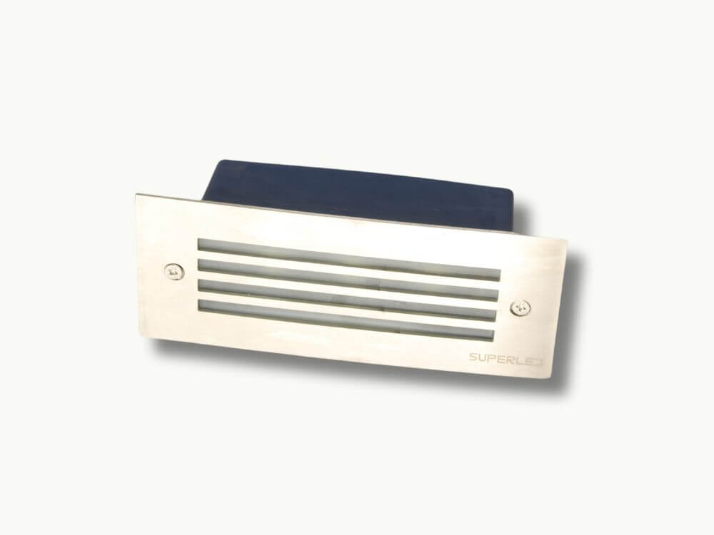 Product image of the Step Light 220V, designed for efficient outdoor lighting. This compact light fixture features a sleek design, perfect for illuminating steps or pathways, highlighting its durability and suitability for various landscape settings.